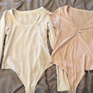American Apparel Cream and Pink Bodysuits medium like new